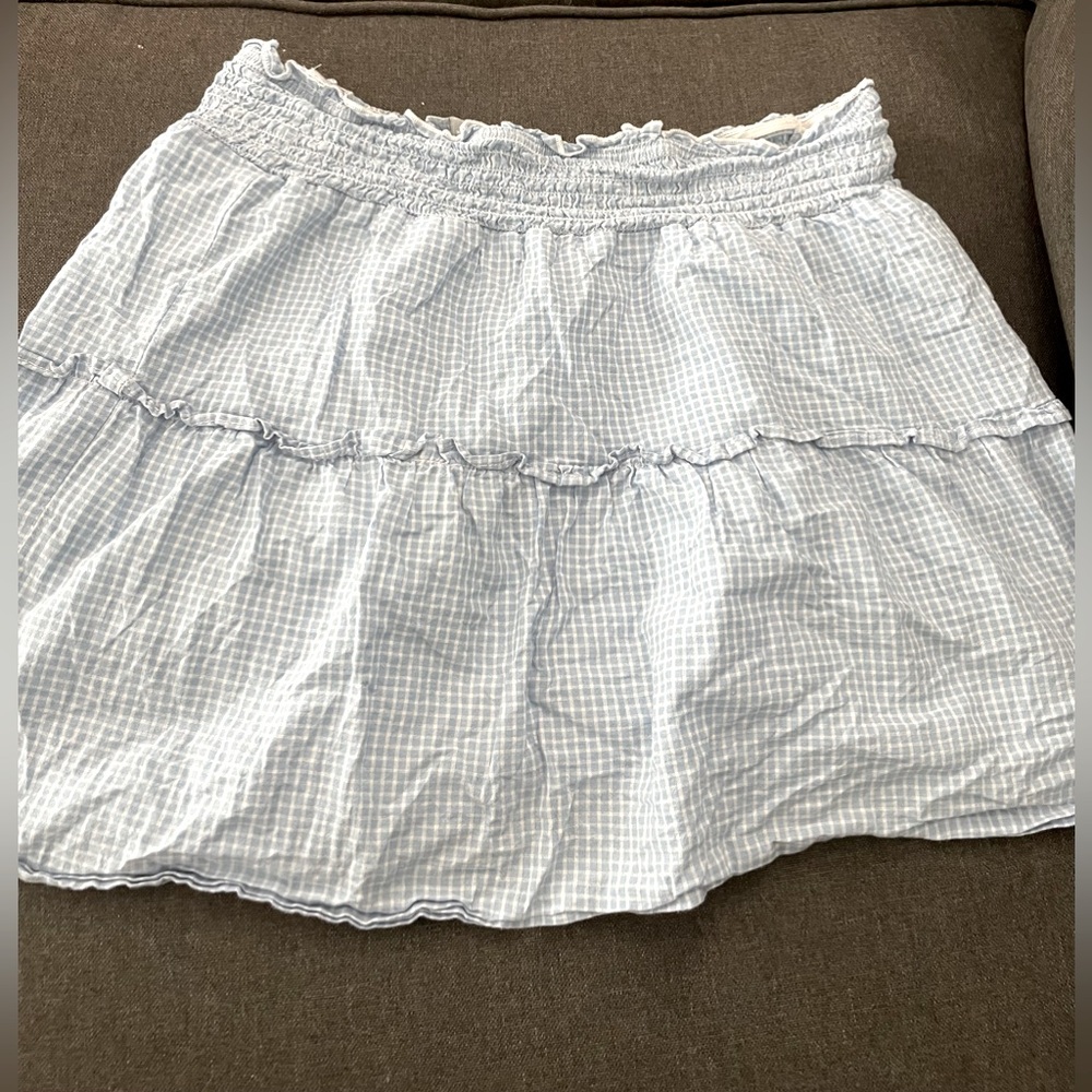 Light blue and white skirt.